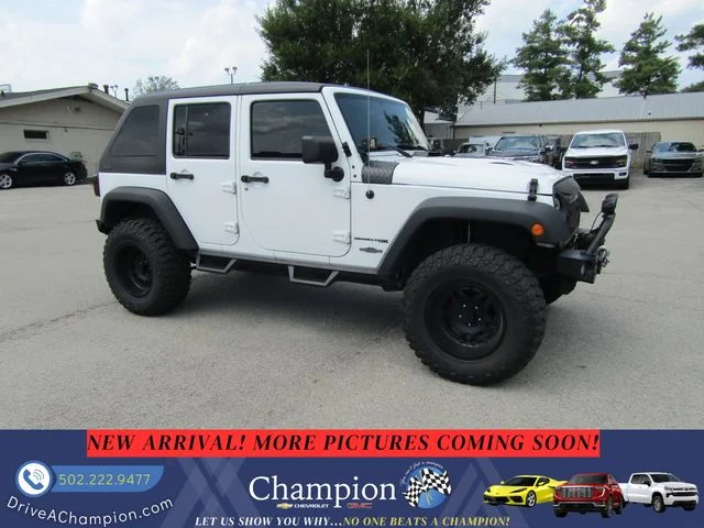 Used 2018 White Jeep Unlimited Sport image 4