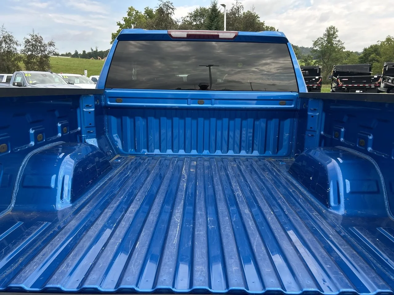 Used 2024 Glacier Blue Metallic Chevrolet LT Trail Boss image 9