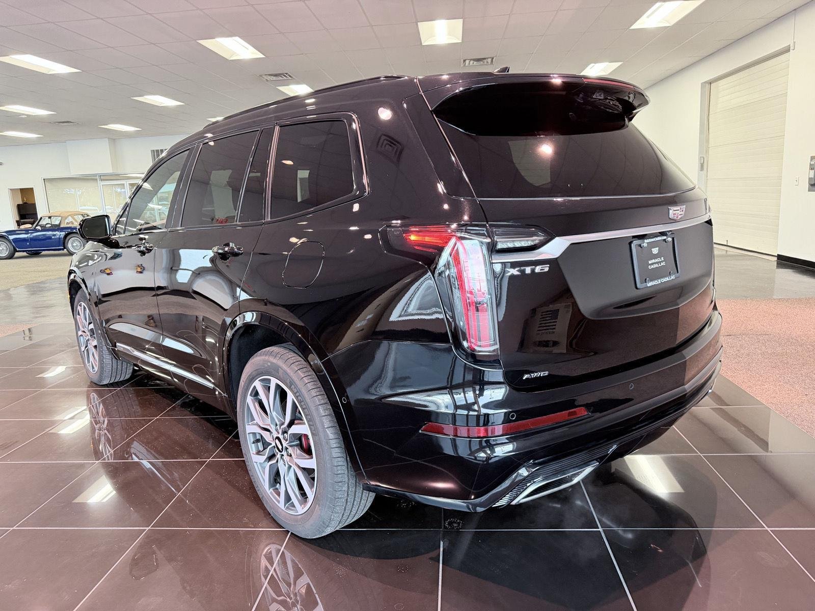 Used 2024 Stellar Black Metallic Cadillac Sport image 5