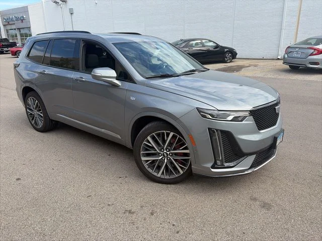 Used 2024 Silver Cadillac Sport image 1