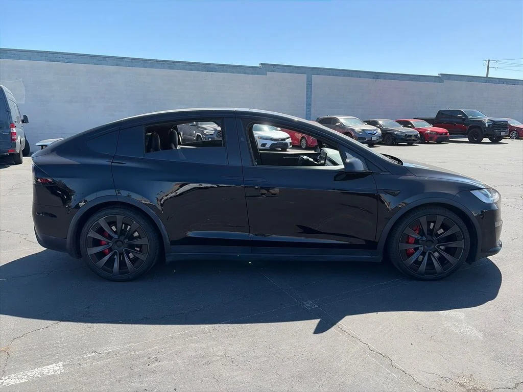 Used 2023 Solid Black Tesla Plaid image 4