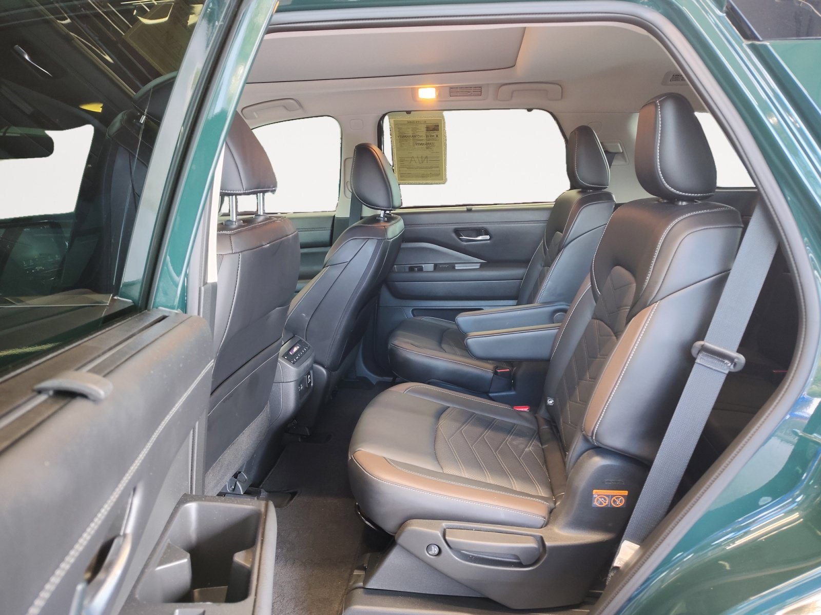 Used 2024 Obsidian Green Pearl Nissan Platinum image 25