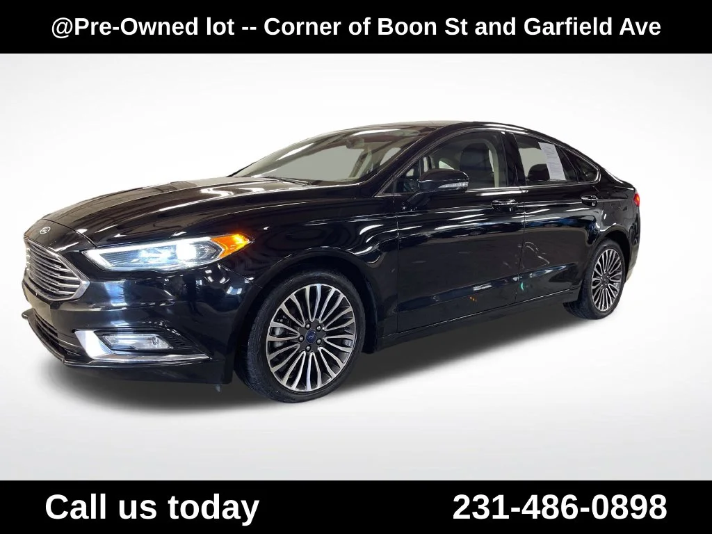 Used 2017 Black Ford SE image 1