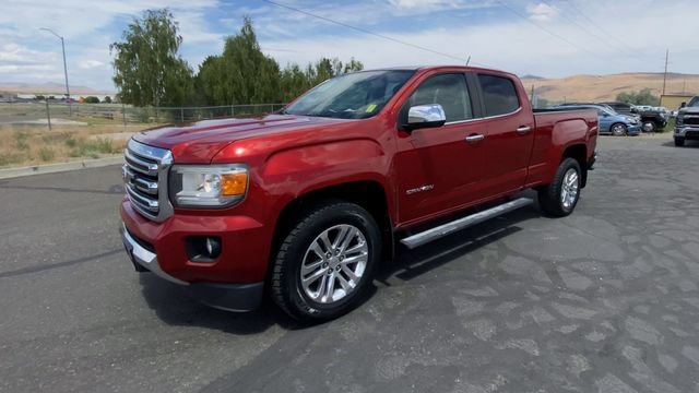 Used 2016 COPPER RED METALLIC GMC 4WD SLT image 4