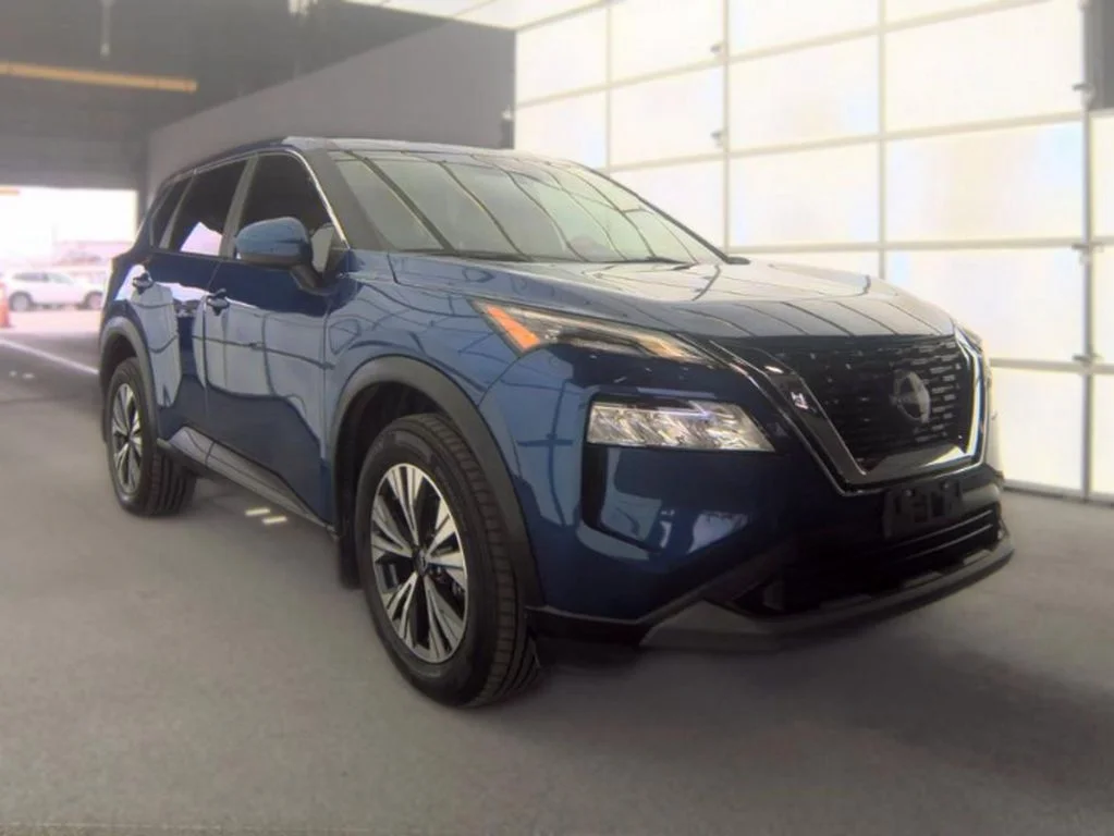 Used 2023 Caspian Blue Metallic Nissan SV image 4