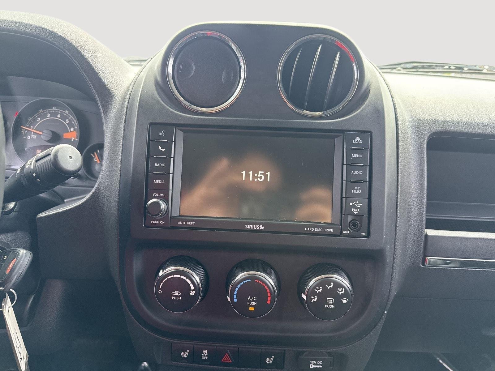 Used 2016 Black Clearcoat Jeep High Altitude Edition image 15
