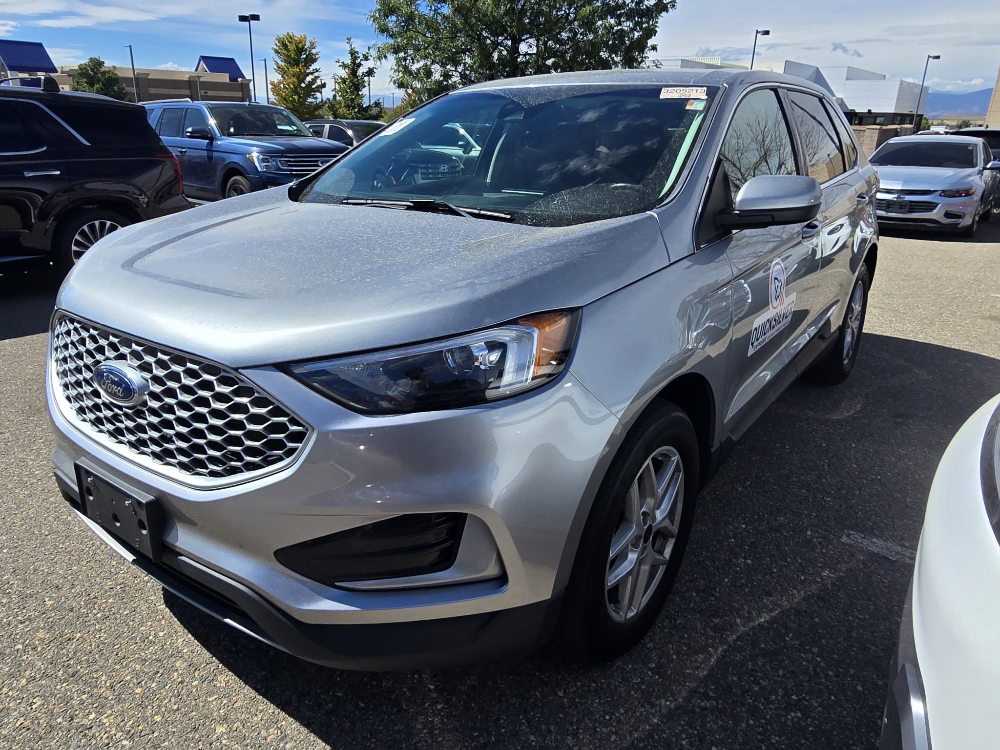 Used 2024 Iconic Silver Metallic Ford SEL image 1