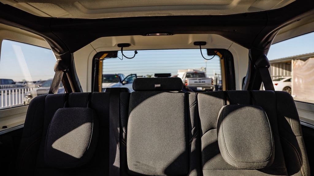 Used 2024 Bright White Clearcoat Jeep Sahara 4xe image 27