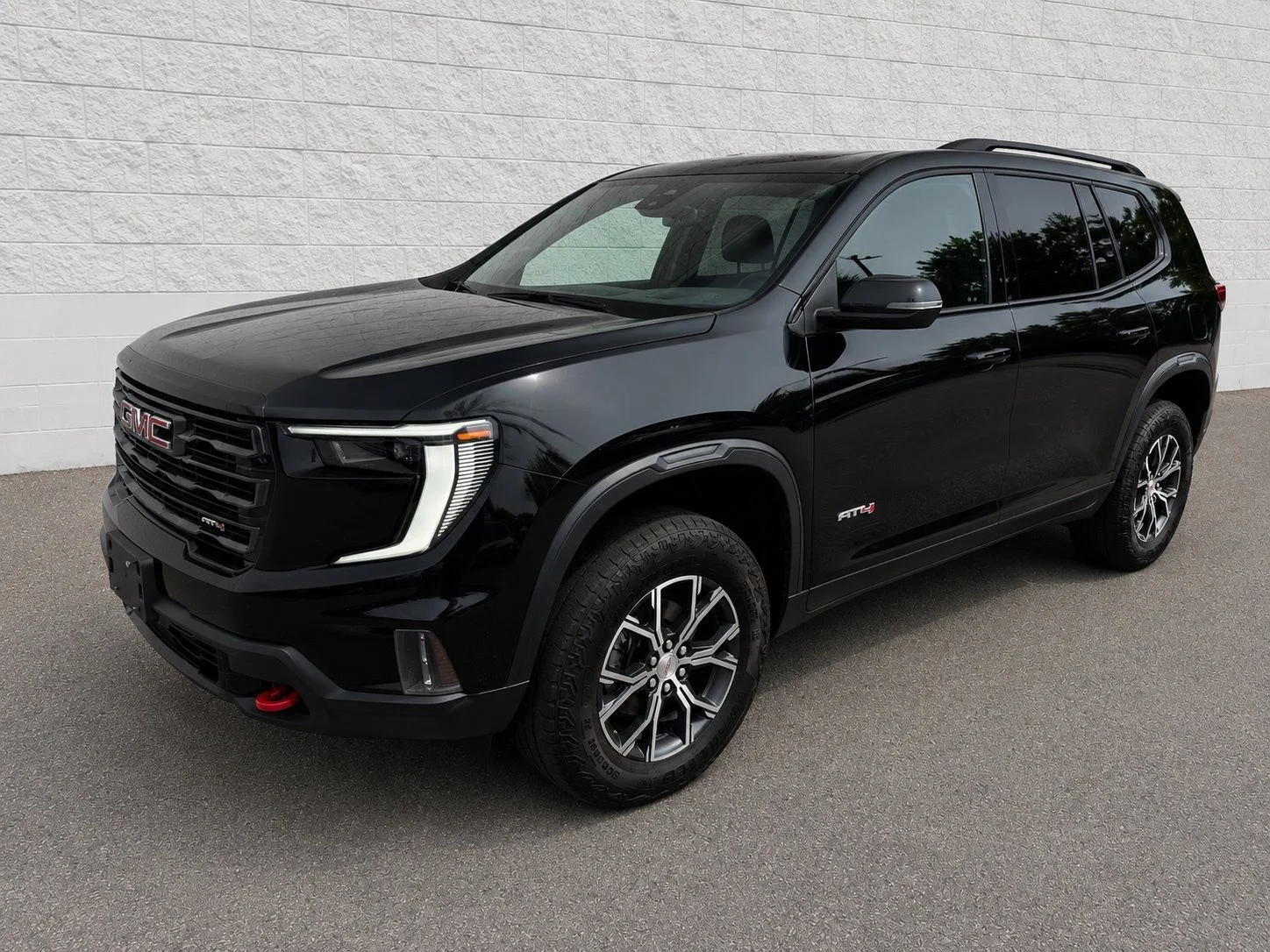Used 2024 Ebony Twilight Metallic GMC AT4 image 1