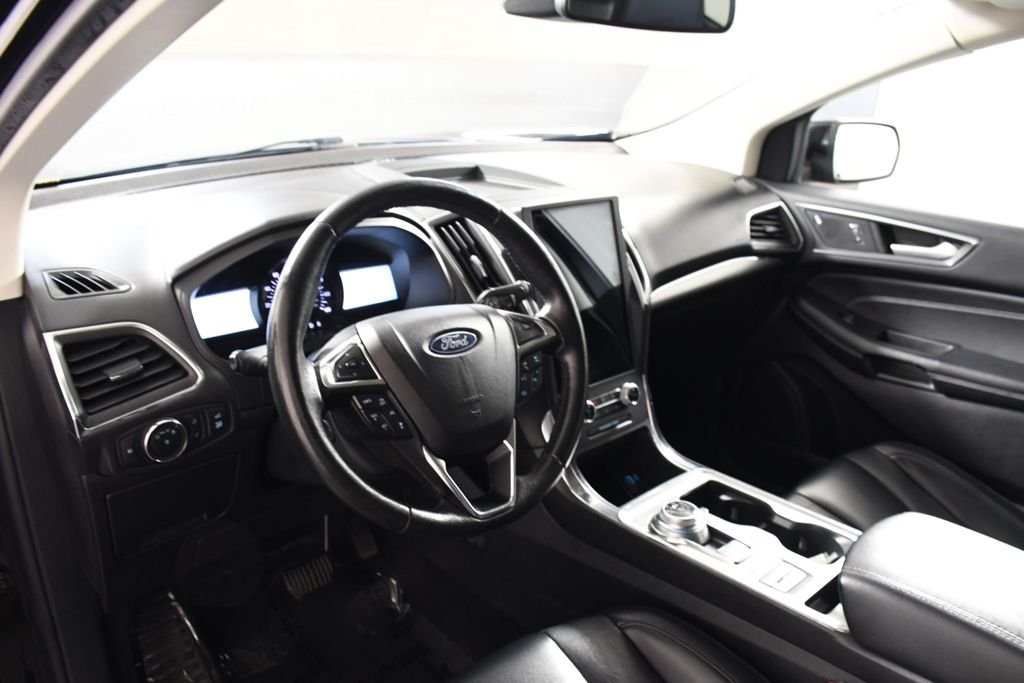 Used 2022 Agate Black Metallic Ford Titanium image 12