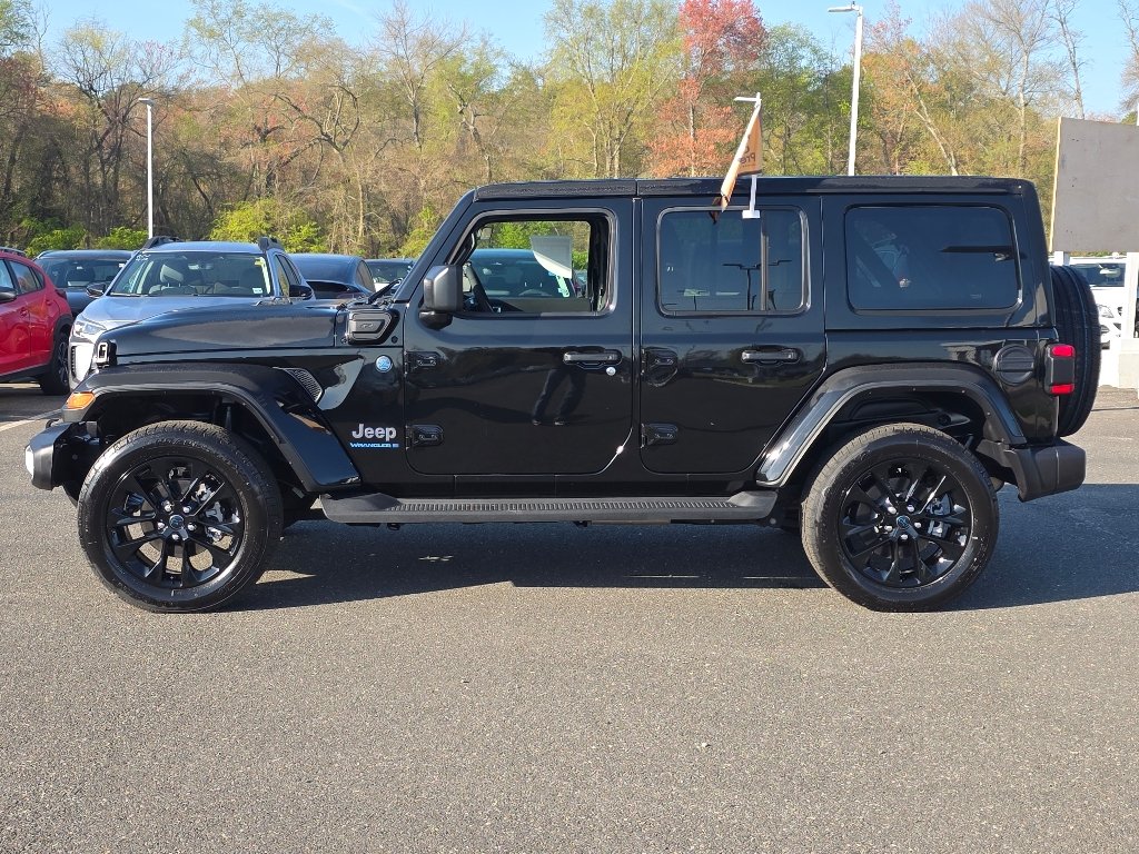 Used 2025 Black Clear Coat Jeep Sahara 4xe image 12