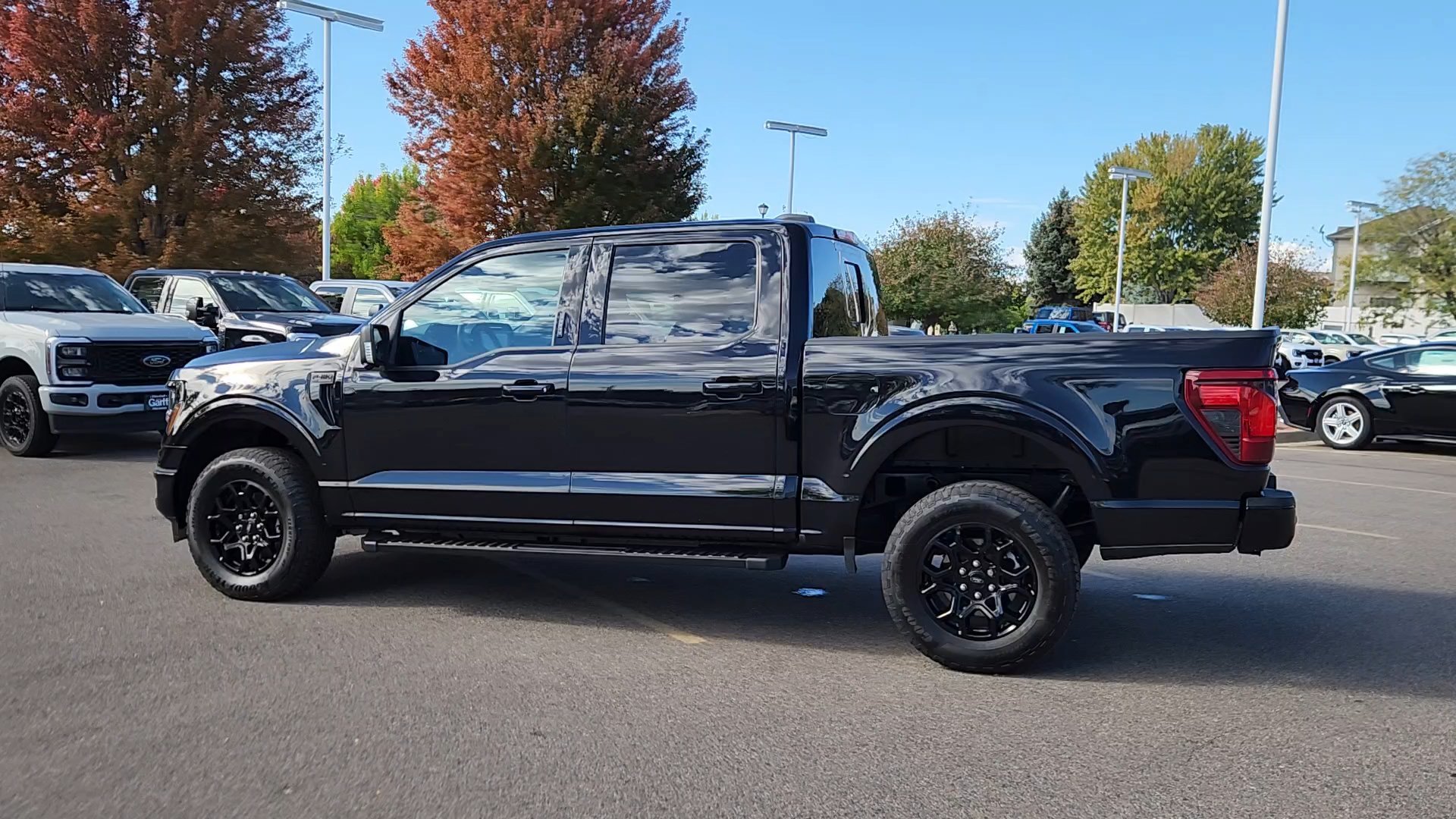 Certified Used 2024 Agate Black Metallic Ford XLT image 21