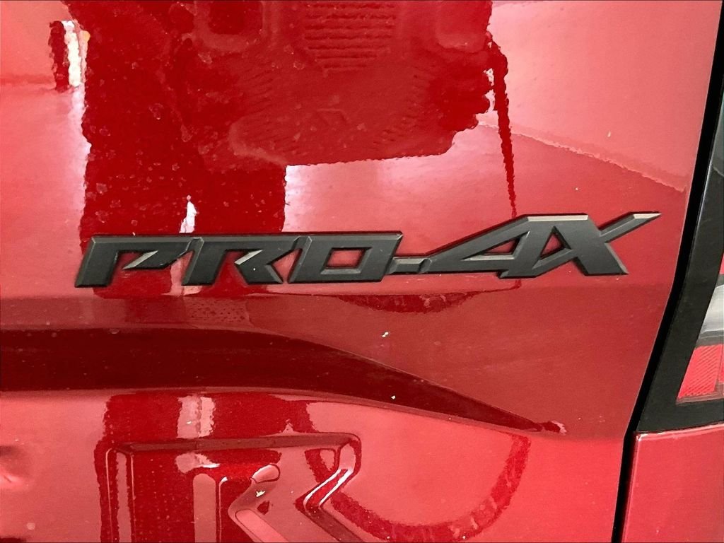 Used 2024 Cardinal Red Metallic Tricoat Nissan PRO-4X image 27
