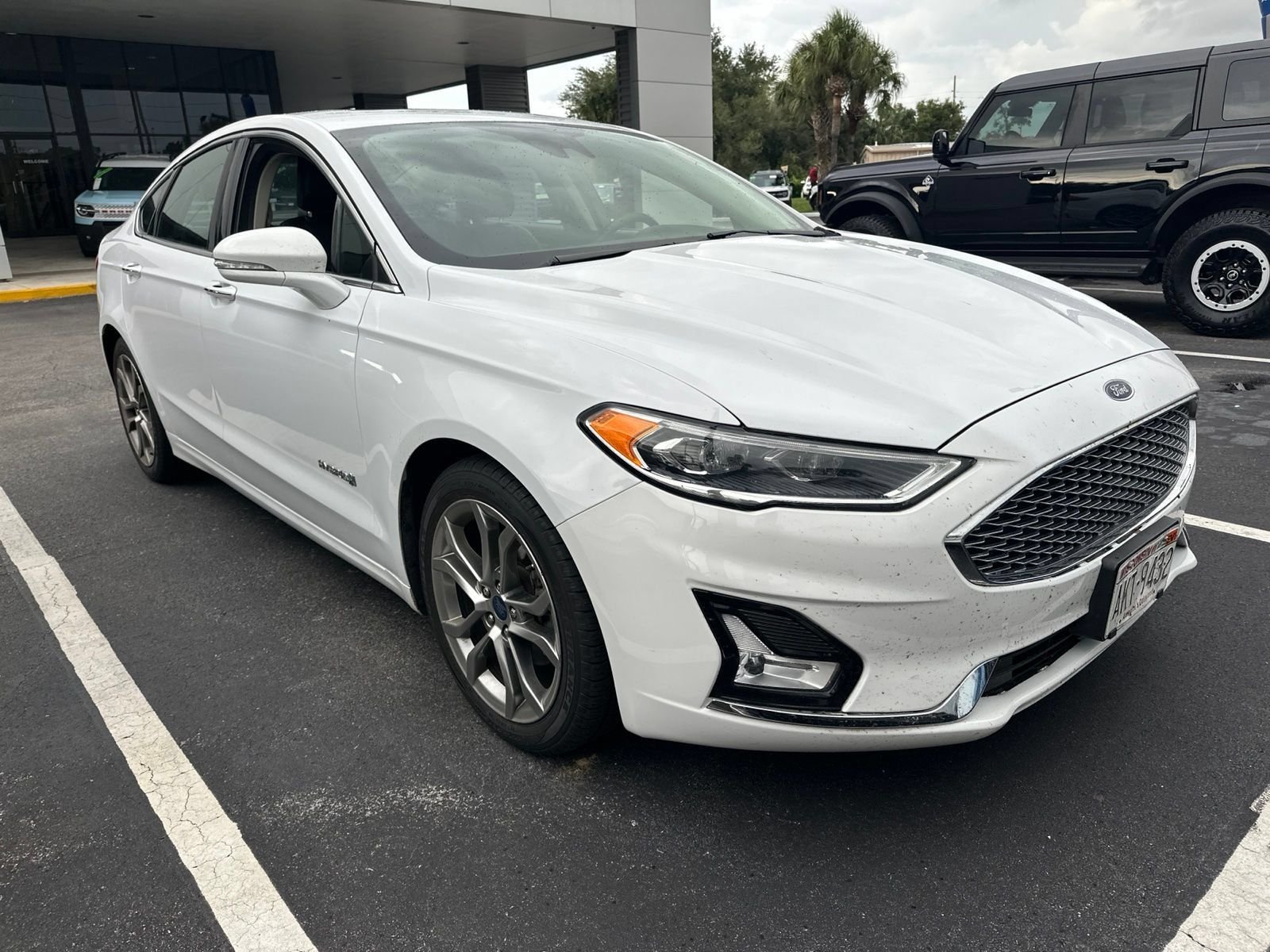 Used 2019 Ford Fusion Hybrid Titanium with VIN 3FA6P0RUXKR190992 for sale in Spring Hill, FL