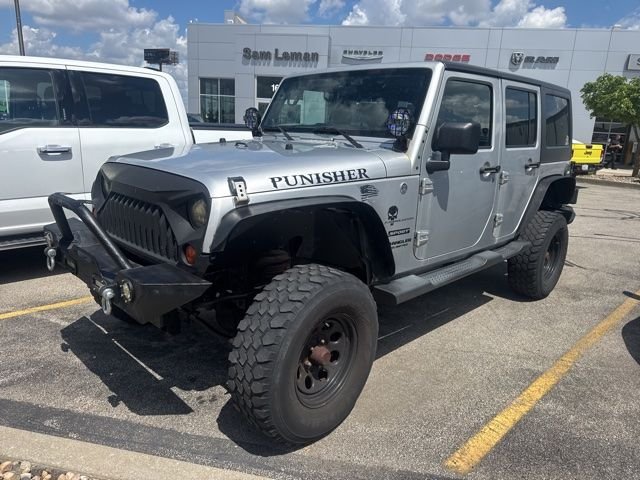 Used 2011 Silver Jeep Unlimited Sport image 3