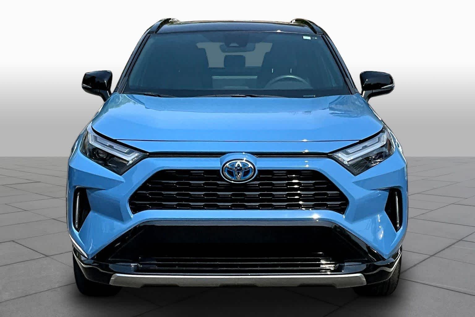 Used 2024 Cavalry Blue/Midnight Black Metallic Toyota Hybrid XSE image 4