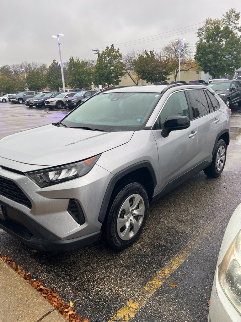 Used 2021 Silver Sky Metallic Toyota LE image 1