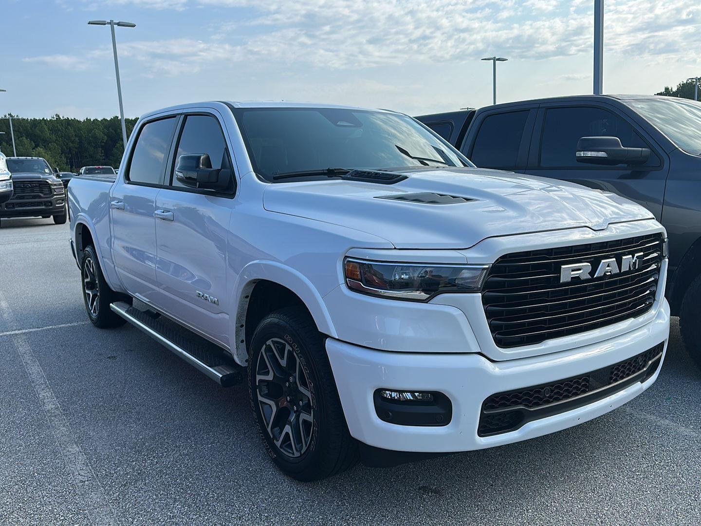 Used 2025 Bright White Clearcoat Ram Laramie image 1