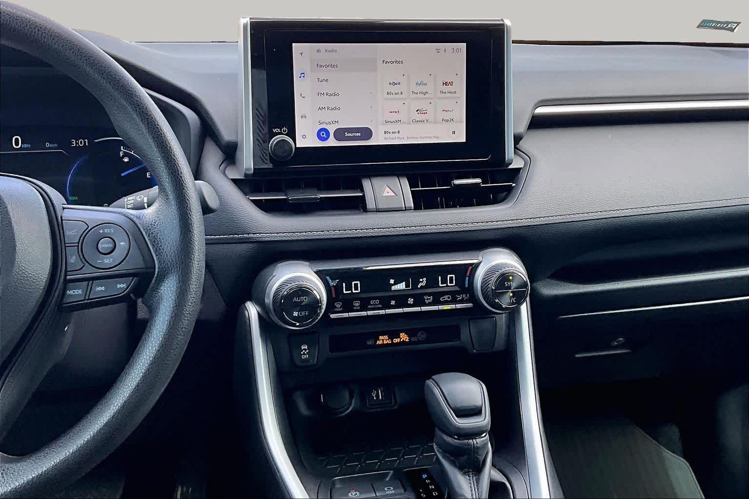 Used 2025 Ice Cap/Midnight Black Metallic Toyota Hybrid Woodland image 7