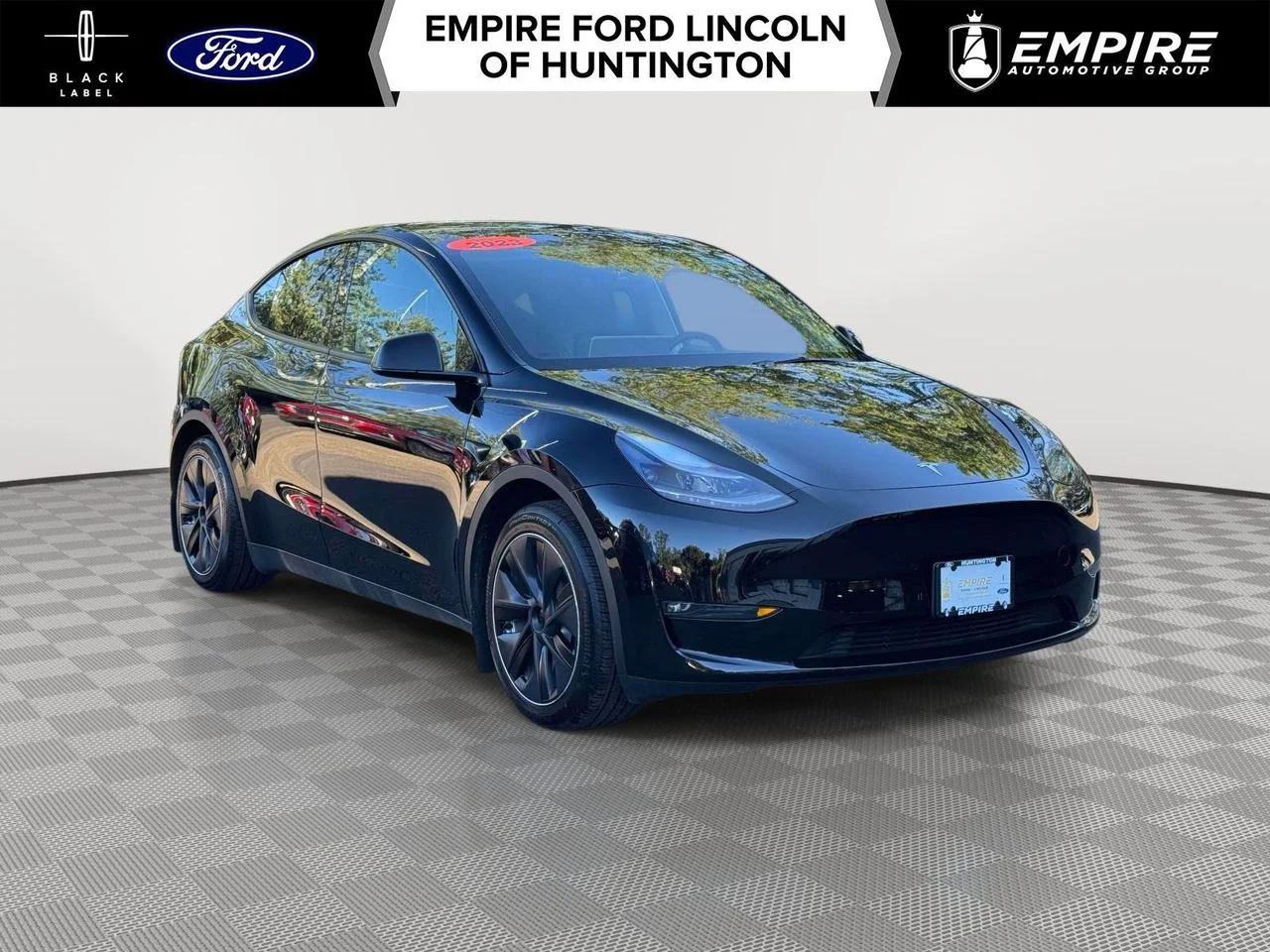 Used 2023 Solid Black Tesla Long Range Dual Motor All-Wheel Drive image 1