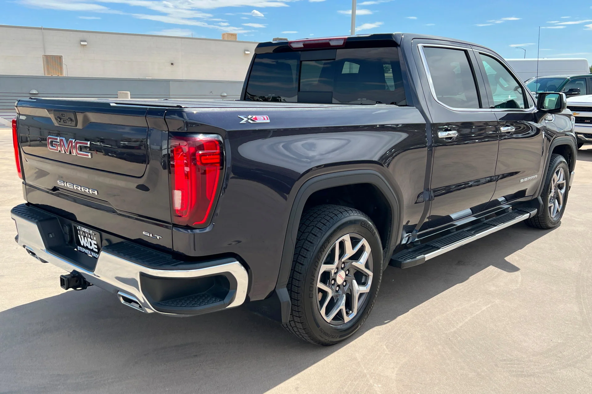 Used 2023 Titanium Rush Metallic GMC SLT image 5