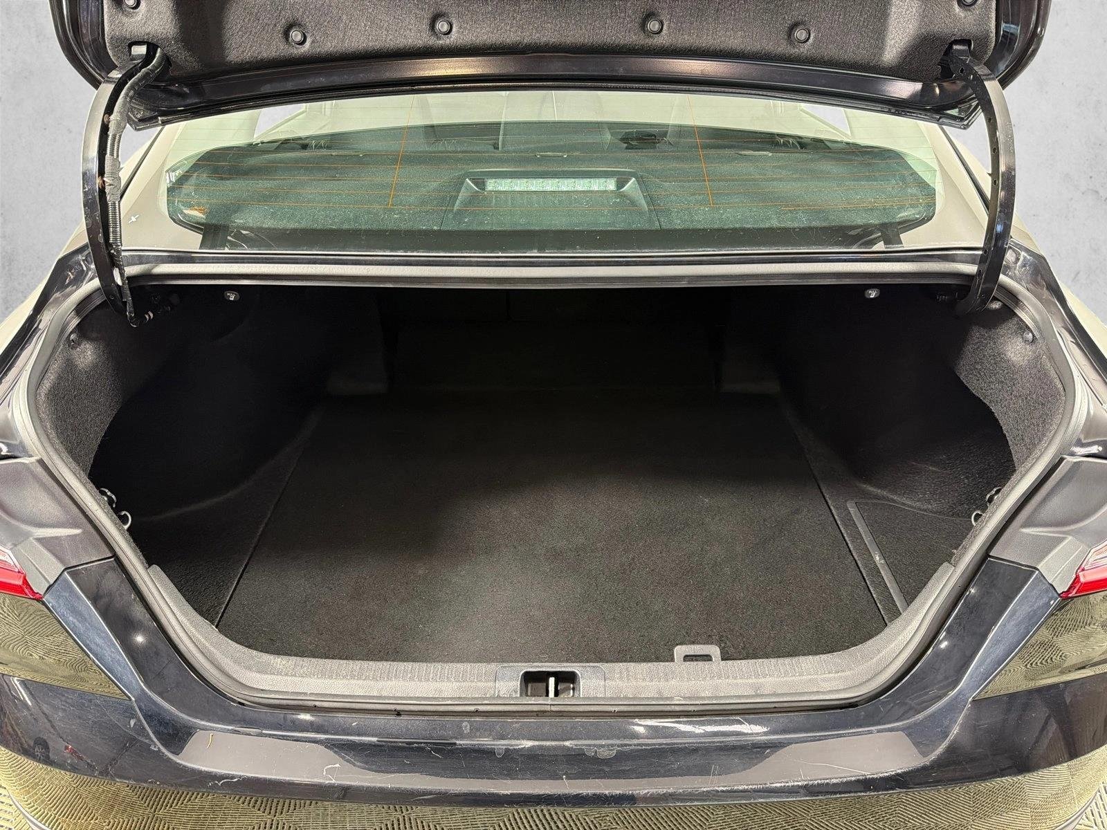 Used 2025 Midnight Black Metallic Toyota LE image 18