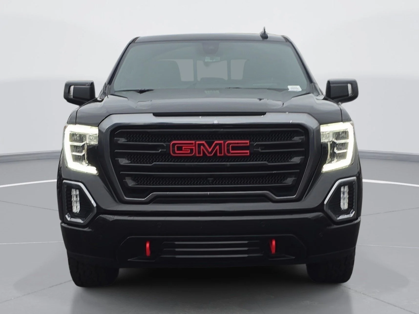 Used 2021 EBONY TWILIGHT METALLIC GMC AT4 image 8