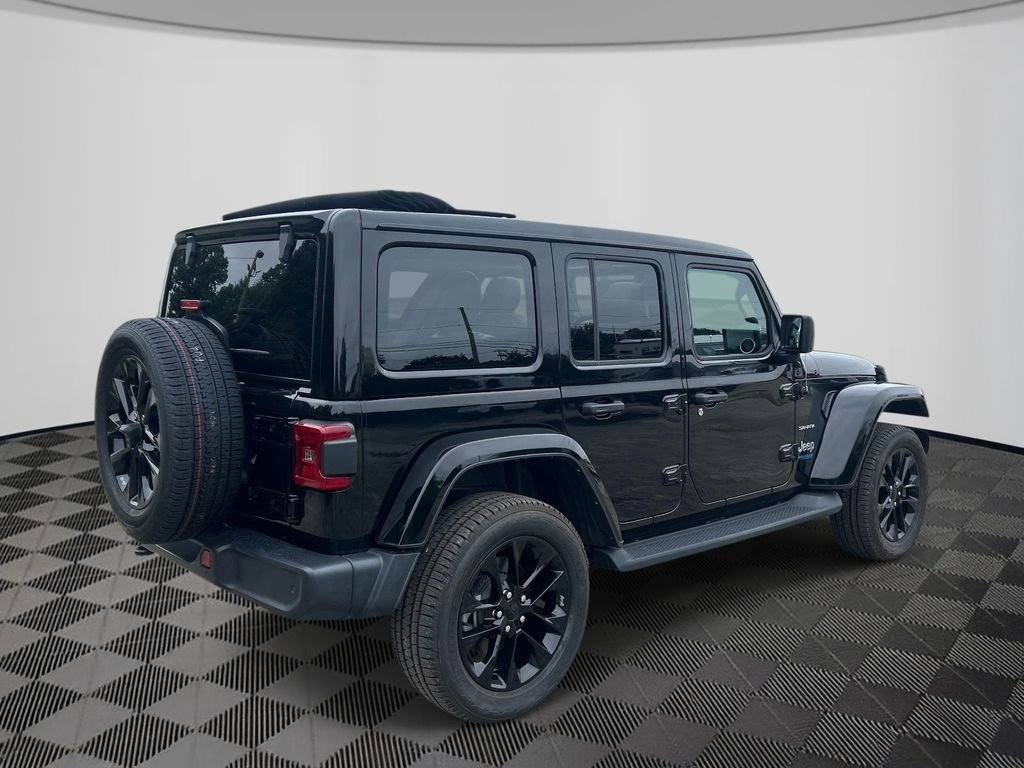 Used 2021 Black Jeep Unlimited Sahara 4xe image 5