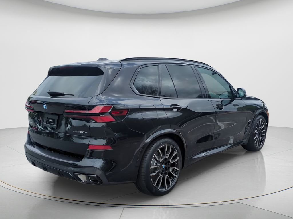 New 2026 Black Sapphire Metallic BMW xDrive50e image 5