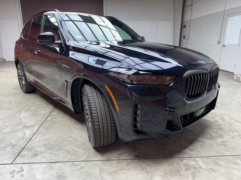 New 2026 Black BMW xDrive50e image 7