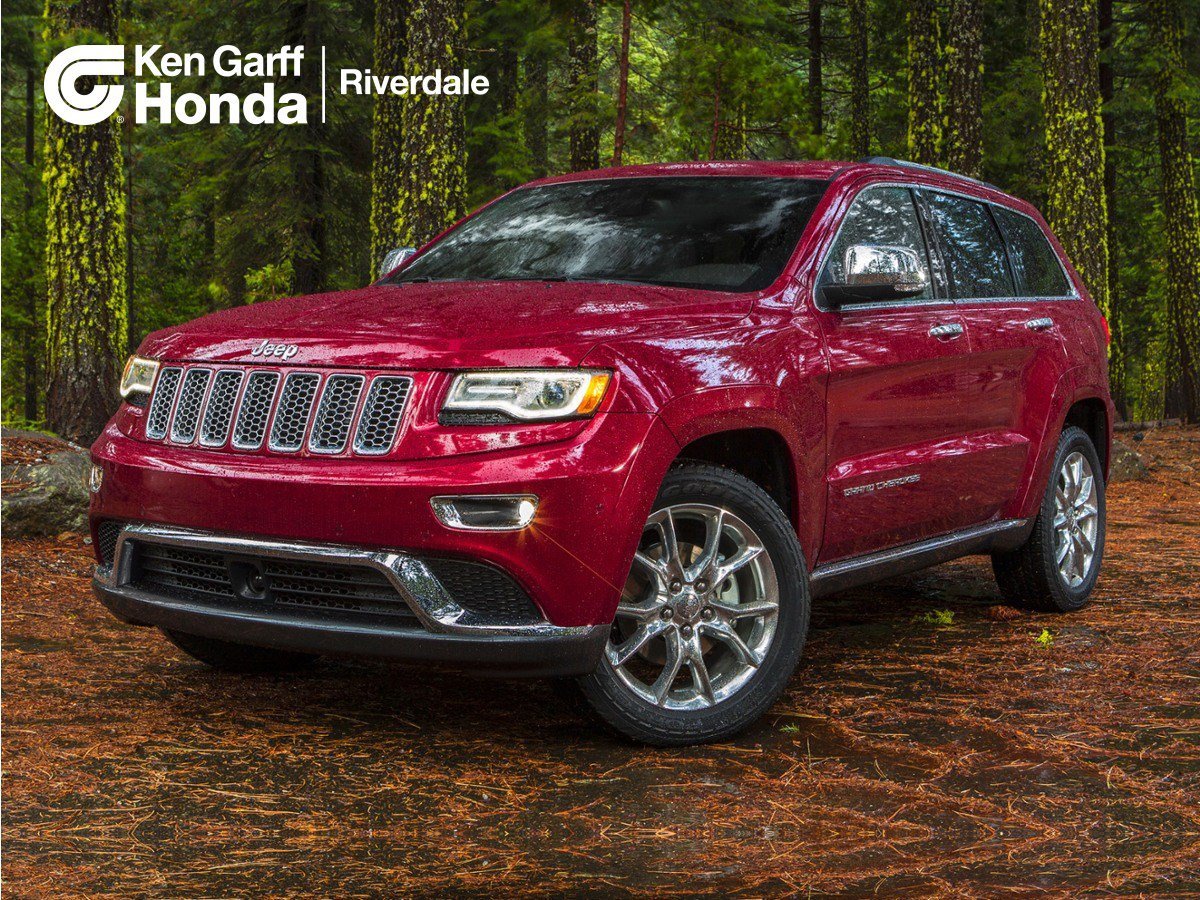 Used 2014 Deep Auburn Pearlcoat Jeep Summit image 1