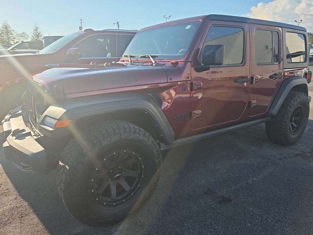 Used 2021 Red Jeep Unlimited Willys image 1