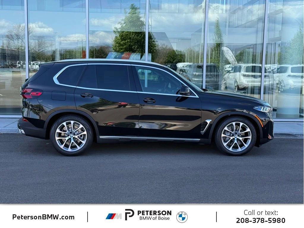 New 2026 Black BMW xDrive50e image 6