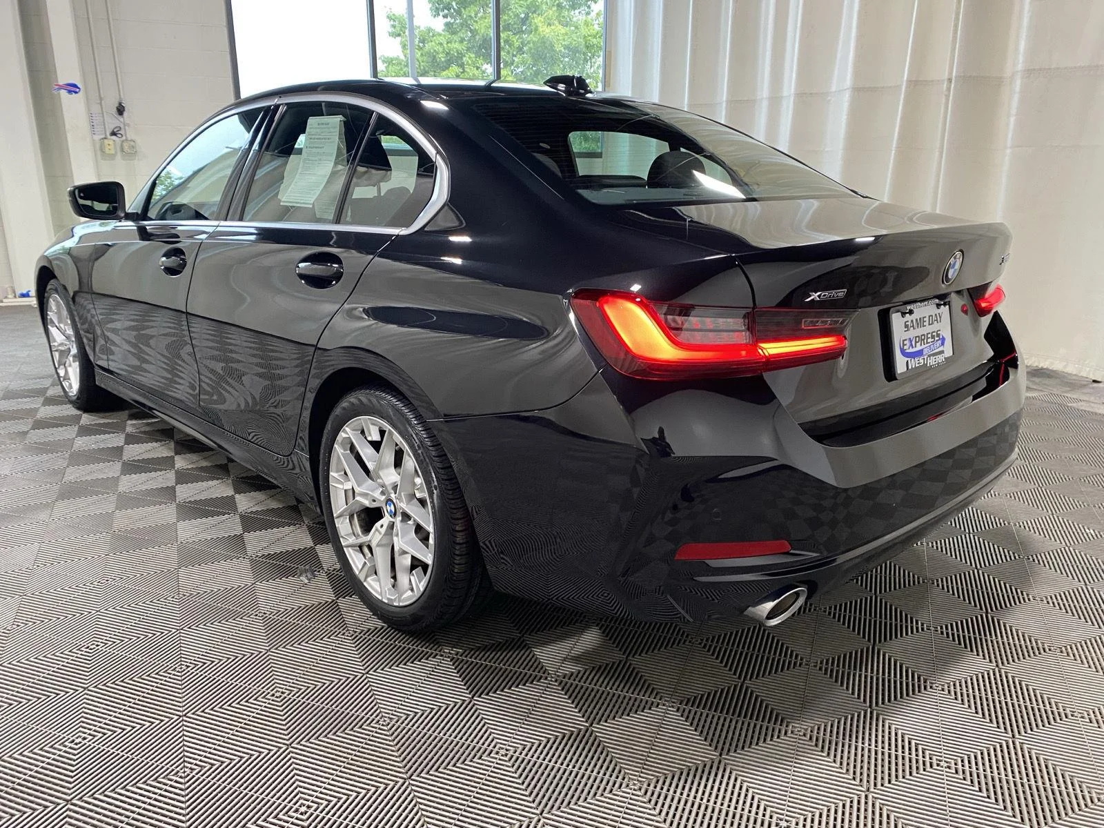 Used 2025 Black Sapphire Metallic BMW 330i xDrive image 11