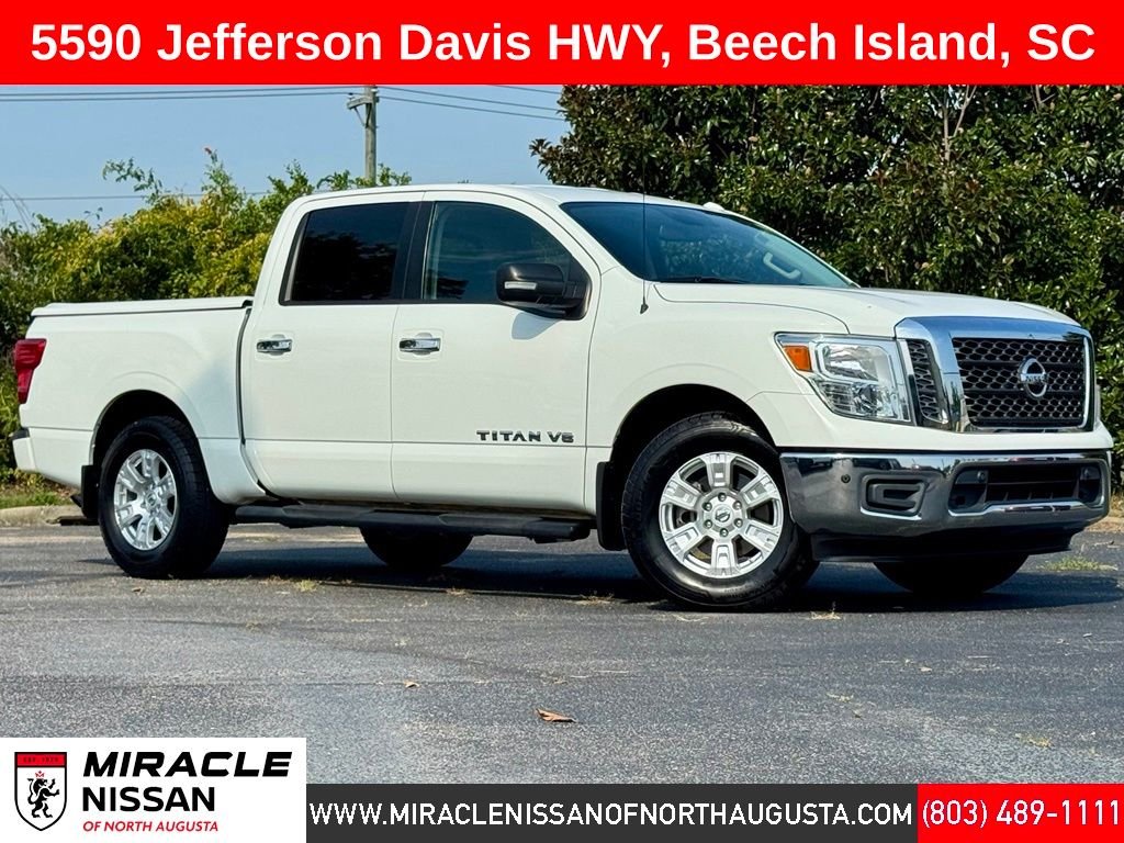 Used 2018 White Nissan SV image 1