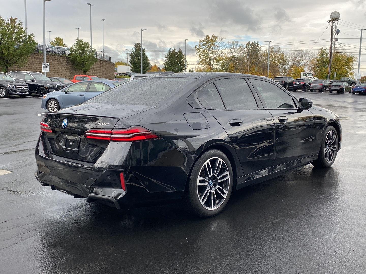 Used 2025 Black Sapphire Metallic BMW 550e xDrive image 3