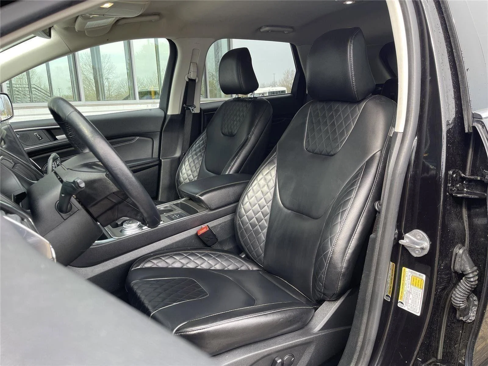 Used 2024 Agate Black Metallic Ford Titanium image 16