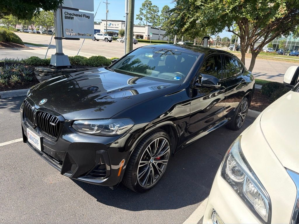 Used 2024 Black Sapphire Metallic BMW M40i image 1