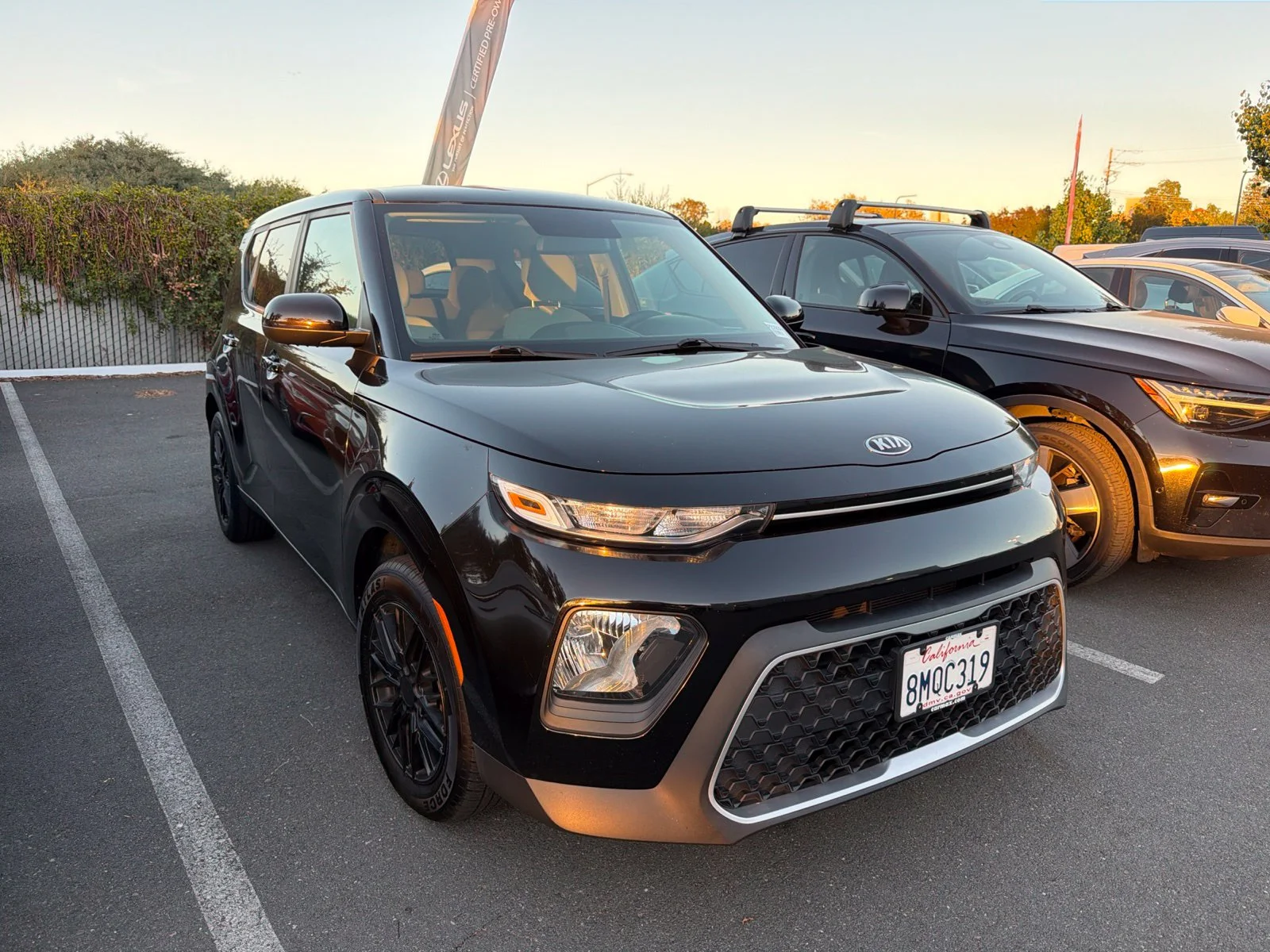 Used 2020 Cherry Black Kia LX image 1