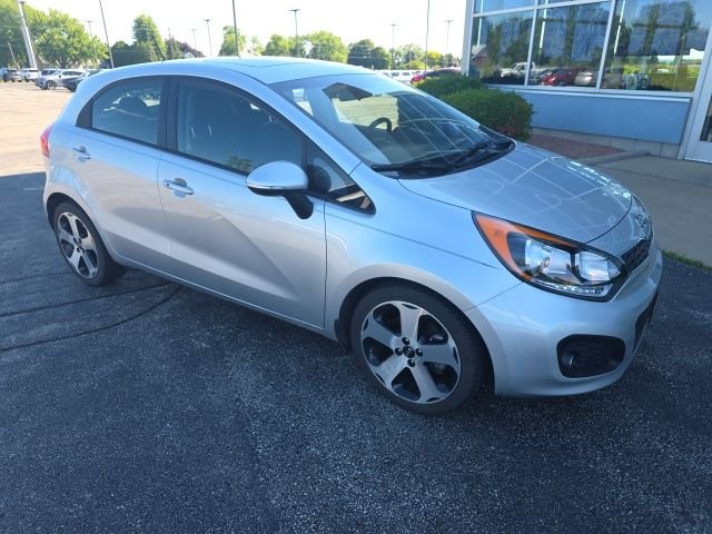 Used 2012 Bright Silver Kia SX image 1