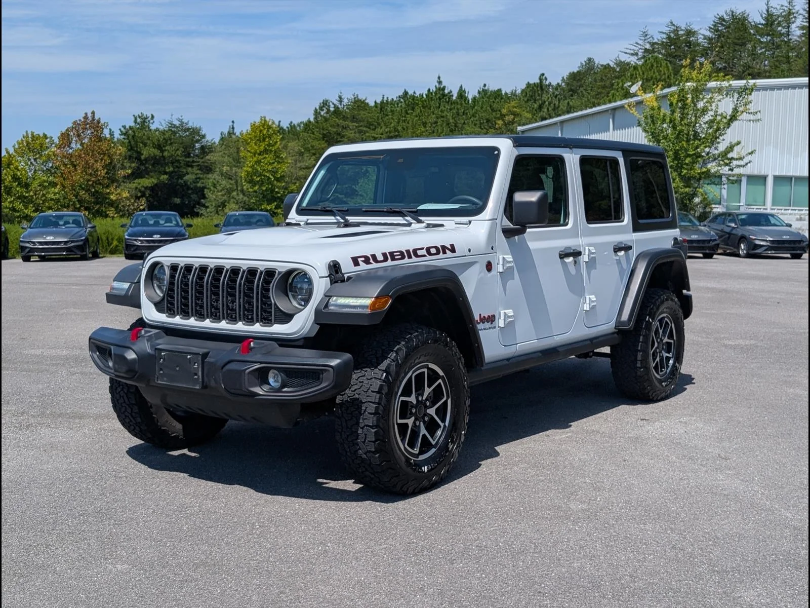 Used 2025 Bright White Clear Coat Jeep Rubicon image 3
