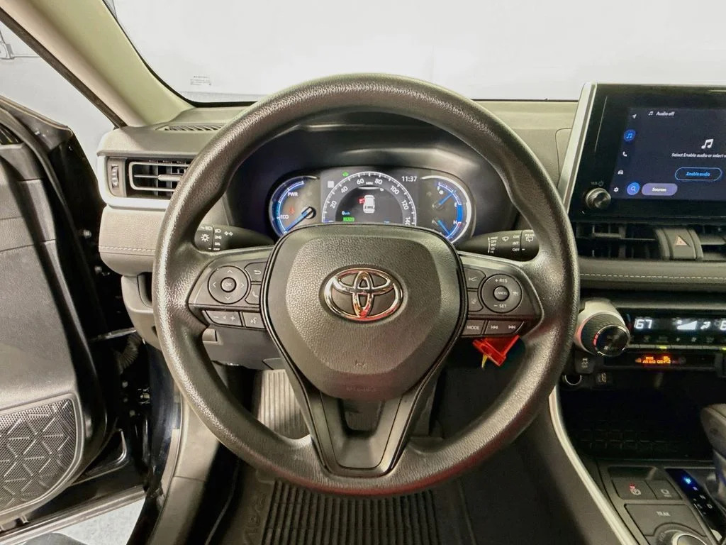 Used 2023 Midnight Black Metallic Toyota Hybrid LE image 11