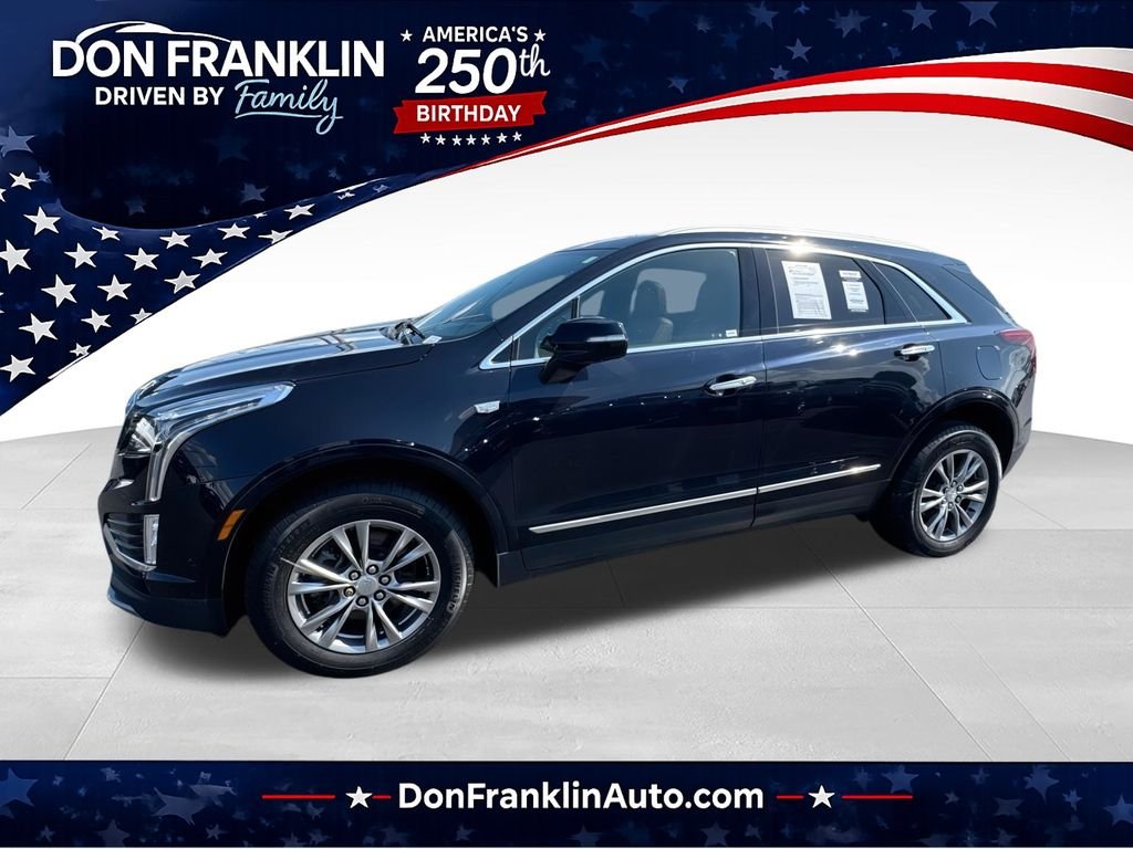 Used 2021 Black Cadillac Premium Luxury image 1