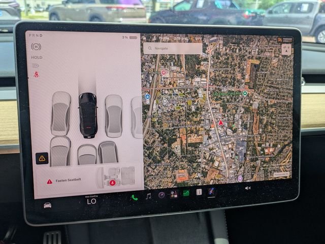 Used 2023 Solid Black Tesla Performance image 21