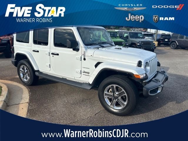 Used 2021 White Jeep Unlimited Sahara image 1