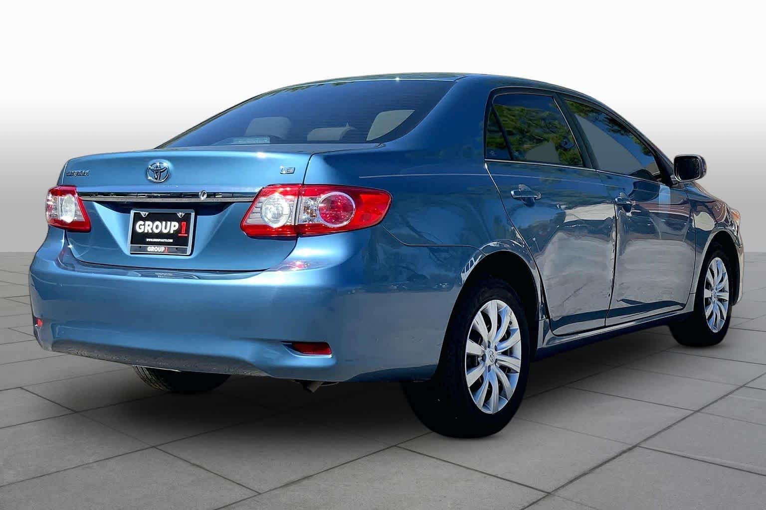 Used 2013 Tropical Sea Metallic Toyota LE image 13