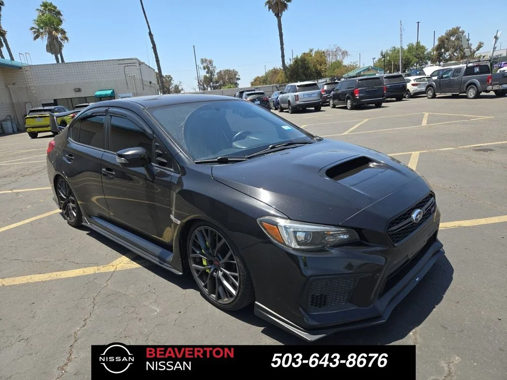 Used 2018 Black Subaru STi image 1