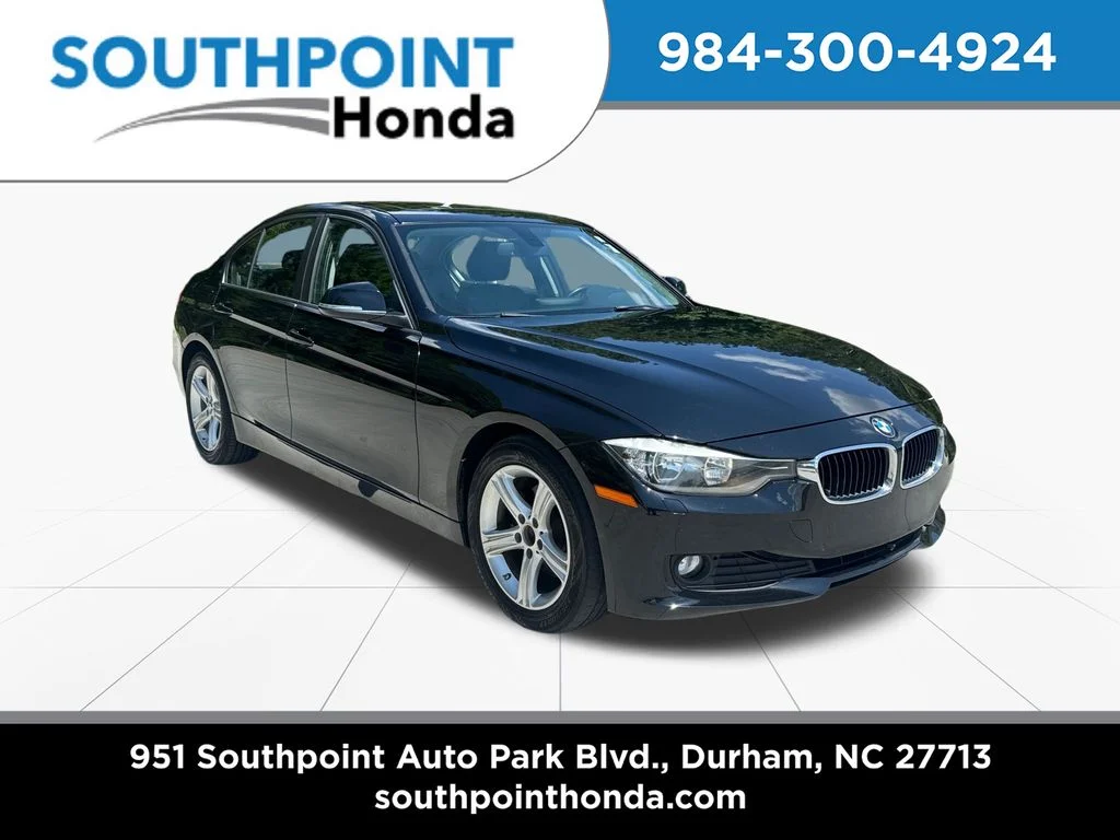 Used 2015 Jet Black BMW 320i xDrive image 1