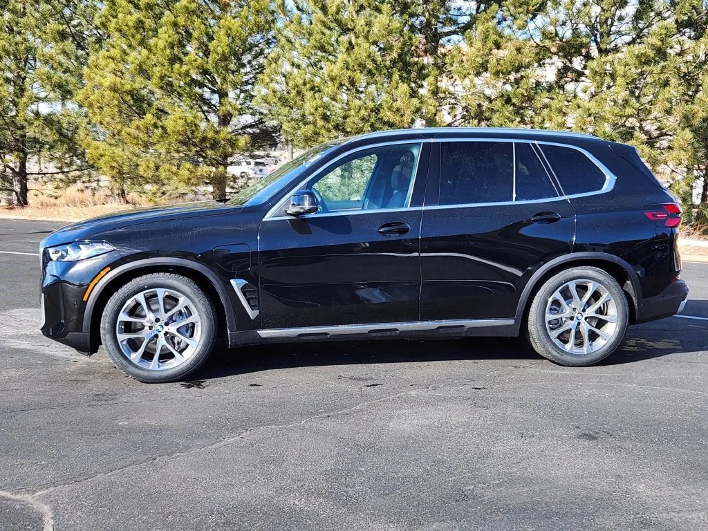 Used 2026 Black BMW xDrive50e image 2