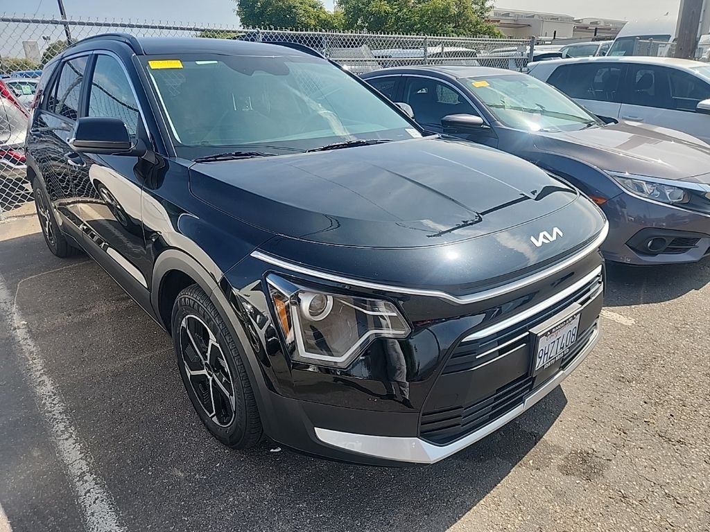 Used 2024 Black Kia EX image 1